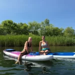 women on paddleboards
